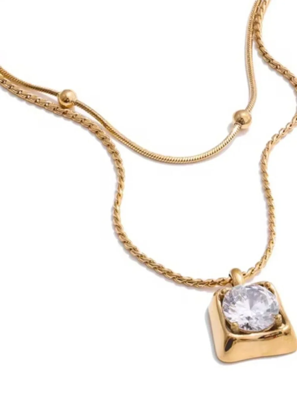 Gold Toned Pendant Necklace with Clear Stone